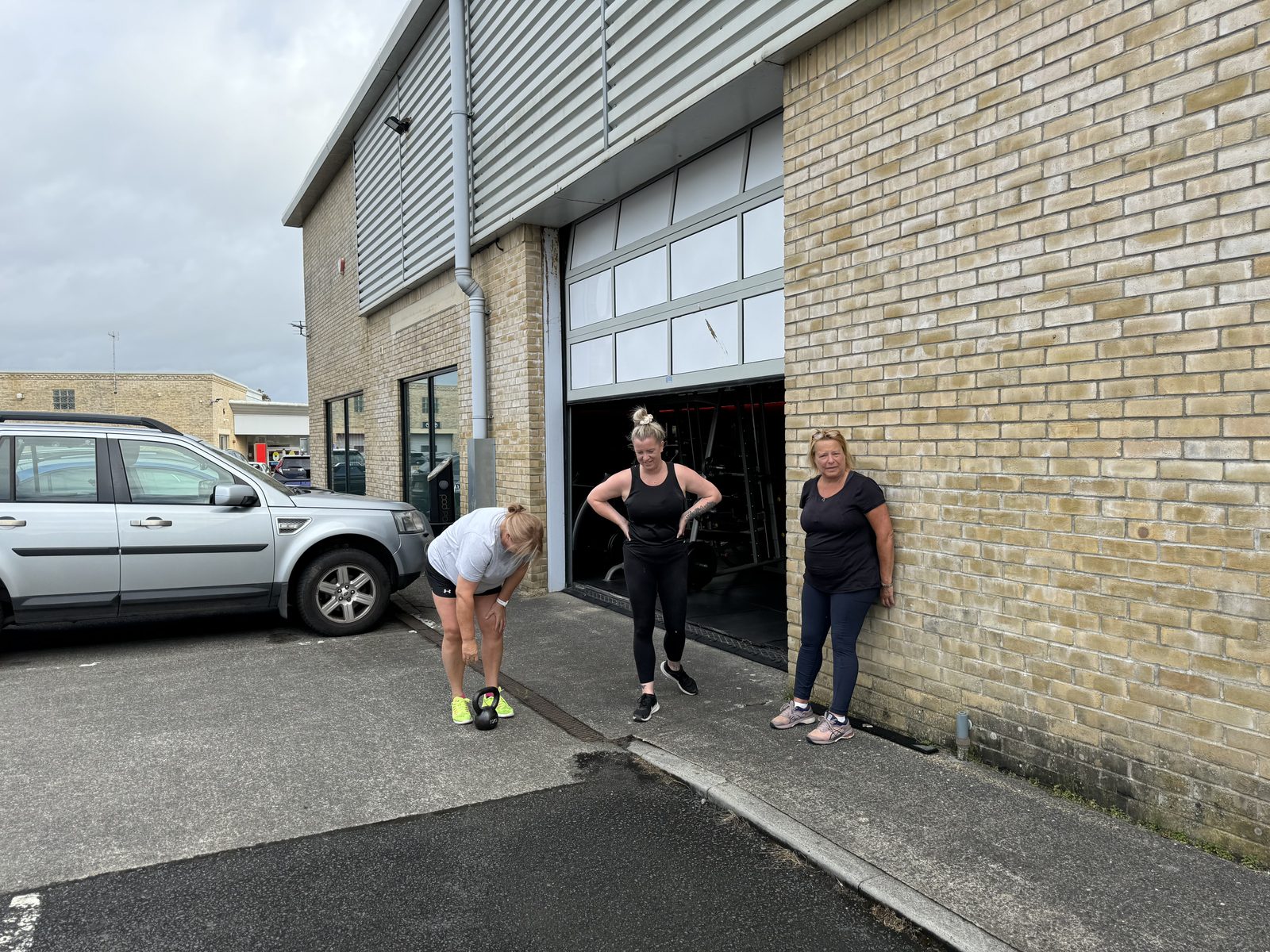Members outside Unit 8, Lauder Lane